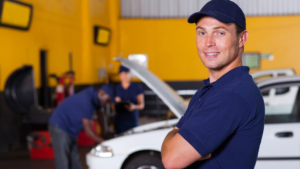 strickand brothers employee smiling at camera with arms crossed